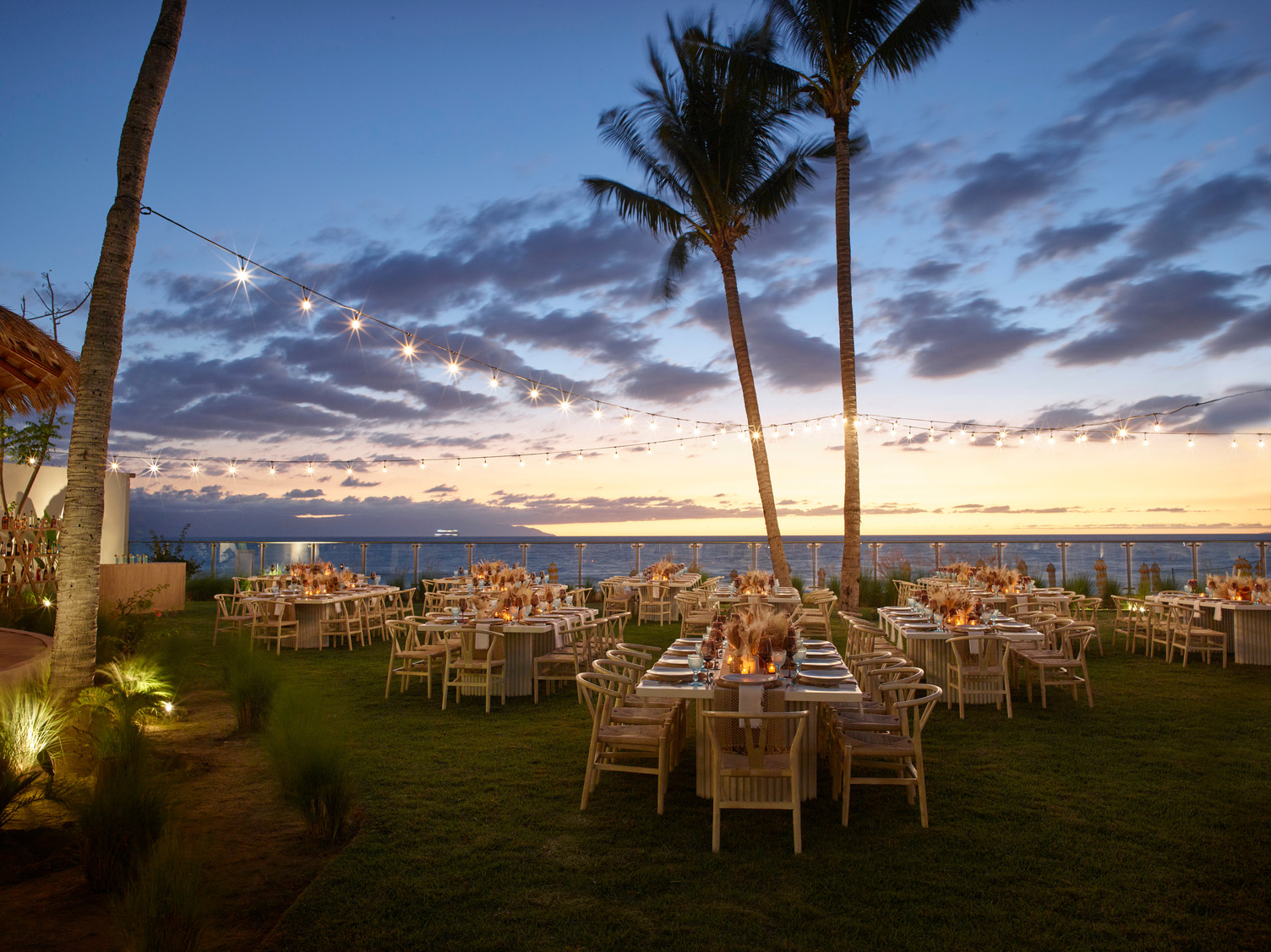 Pacific Garden celebration space at UNICO 20°105° lit for an outdoor evening event
