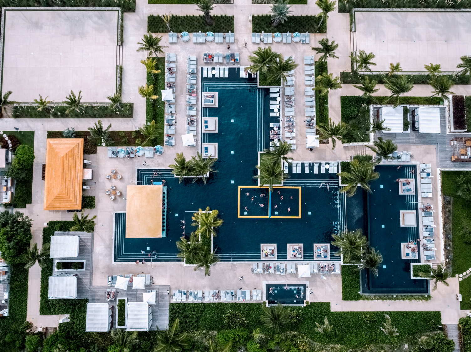 Drone aerial view of volleyball at UNICO resort.